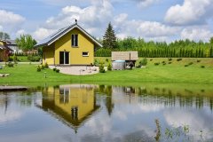 „Vėliučionių sodyba“ Vilniaus rajone - nameliai, salė, pirtys, kubilas logo