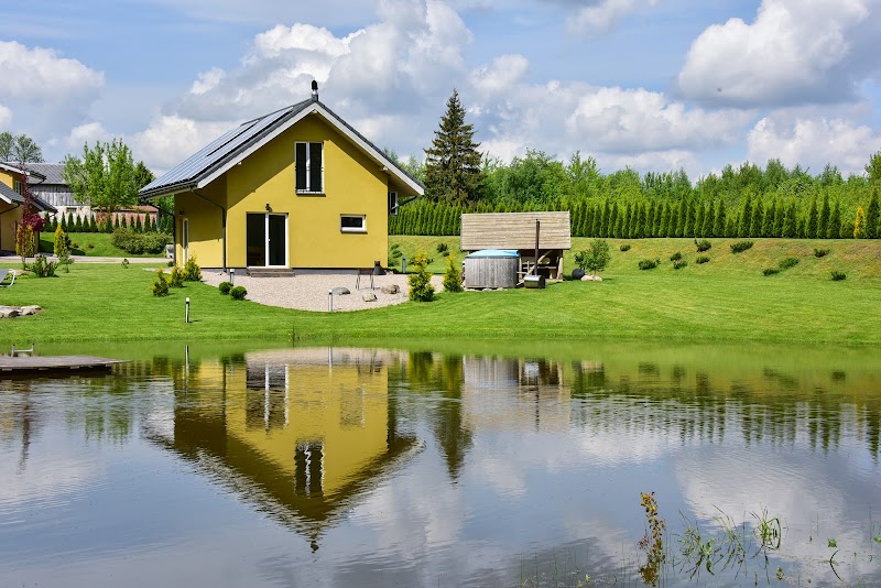 „Vėliučionių sodyba“ Vilniaus rajone - nameliai, salė, pirtys, kubilas logo
